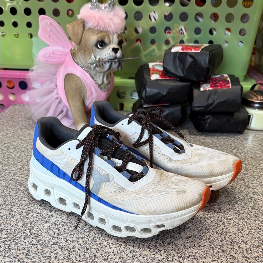 On Running White and Blue Athletic Shoes